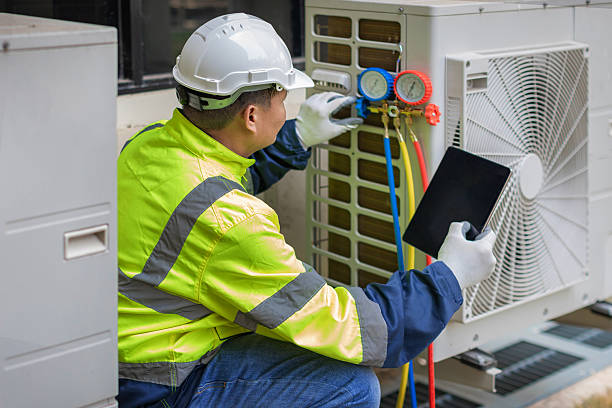 Professional Heat Pump Repair technician working in Apple Valley, CA